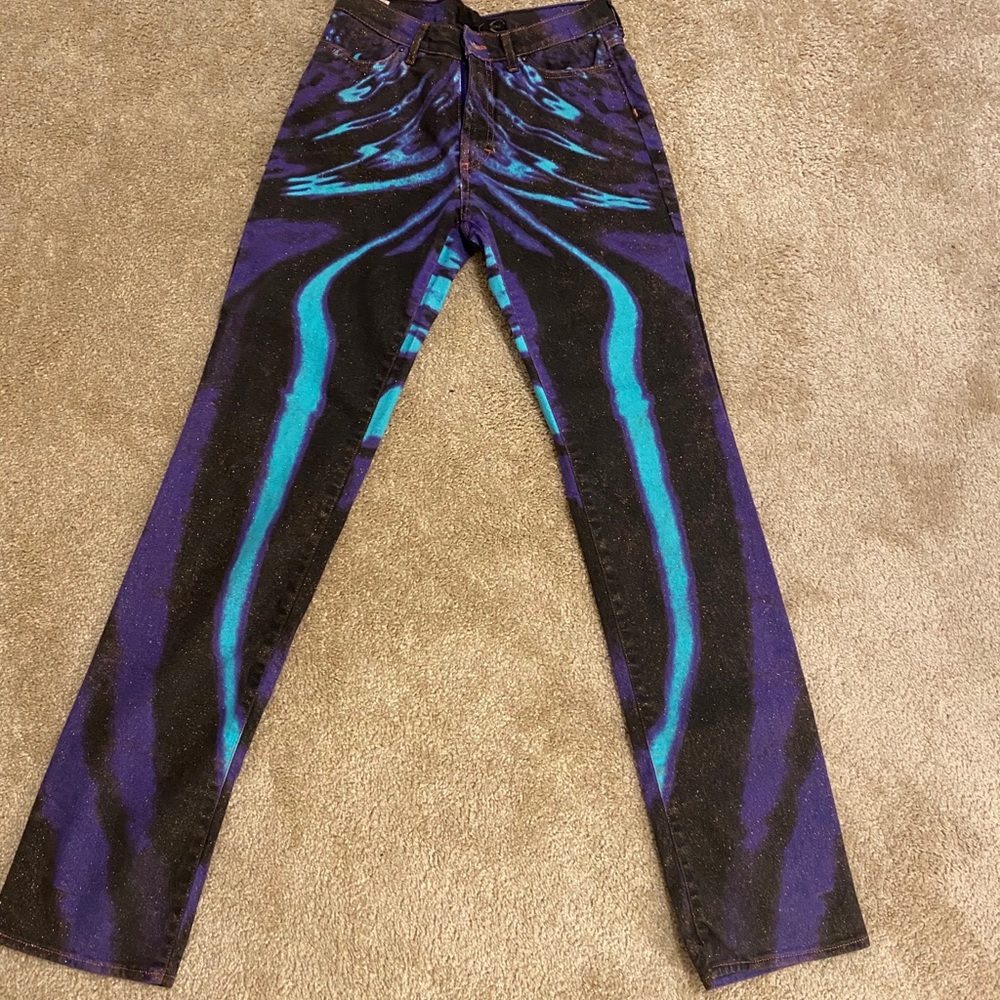 Turquoise, black, and purple with golden shimmer